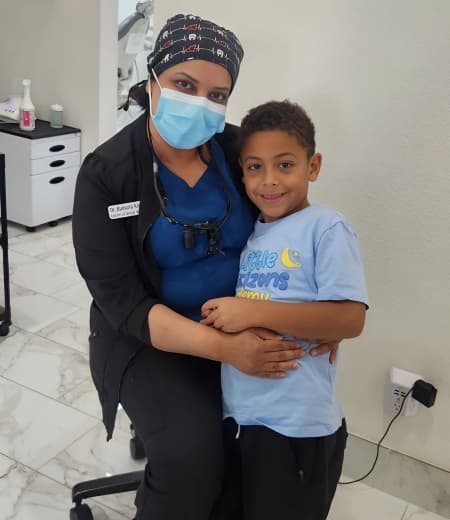 Adult woman smiling in dental office