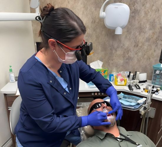 Professional dentist smiling